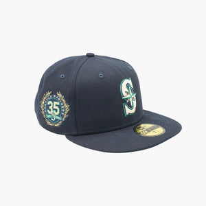 https://www.simplyseattle.com/cdn/shop/files/New-Era-Seattle-Mariners-Regal-Laurels-Fitted-Hat-Side_1_300x.jpg?v=1701582837